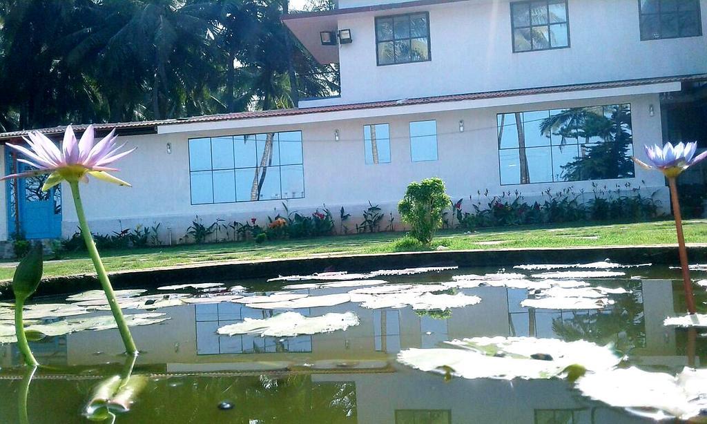 منغالور Nisarga Nirvana River House المظهر الخارجي الصورة